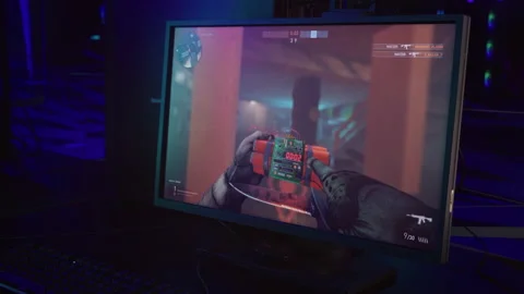 Winning the match of the multiplayer shooter pc online game esports competition Stock Footage 218619523