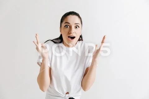 Winning success woman happy ecstatic celebrating being a winner. Stock Photos