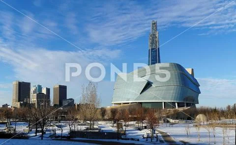 Winnipeg downtown cityscape. Winter view on Canadian Museum for Human Rights Stock Photos