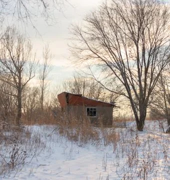 Winter abandoned house in the forest Stock Photos