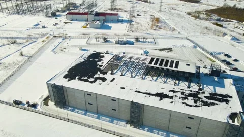 Winter Aerial of Data Center and Power Substation Stock Footage 329679009