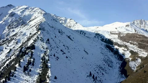 Winter aerial flight over the mountain landscape near Almaty city, Kazakhstan Video stock 166197573