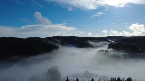 Winter aerial panorama of Black Forest with snow and blue sky Stock Footage 329938112