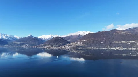 Winter aerial view of Lake Como landscape and alpine mountains Video stock 328010036