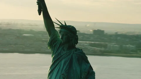 Winter aerial view of orbiting the Statue of Liberty to downtown Manhattan durin Stock Footage 199462325