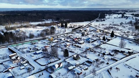 Winter Aerial View of Snow Covered Rural Residential Neighborhood Stock Footage 337901229
