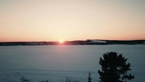 Winter aero frame, snow river and sunset 스톡 동영상 133357274
