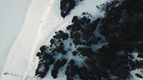 Winter aero frame, snow river and sunset Stock Footage 133357309
