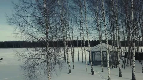 Winter aero frame, snow river and sunset Stock Footage 133357355