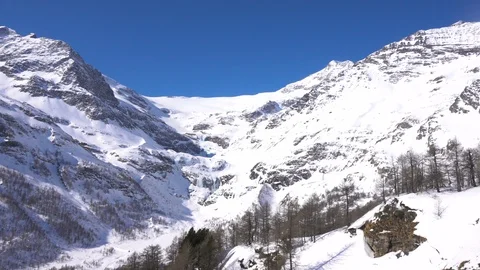 Winter Alps Landscape seen from Red Train Bernina Railway Stock Footage 87669775