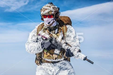 Winter arctic mountains warfare Stock Photos
