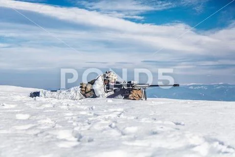 Winter arctic mountains warfare Stock Photos