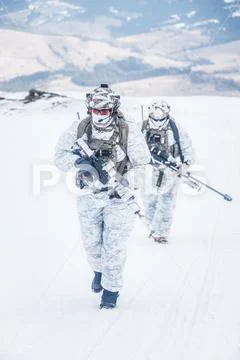 Winter arctic mountains warfare Stock Photos