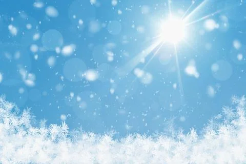 Winter background with bright sunlight, soft falling snow, bokeh light effe.. 스톡 사진