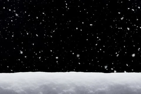 Winter background. falling snow isolated on black background with copy space Stock Photos