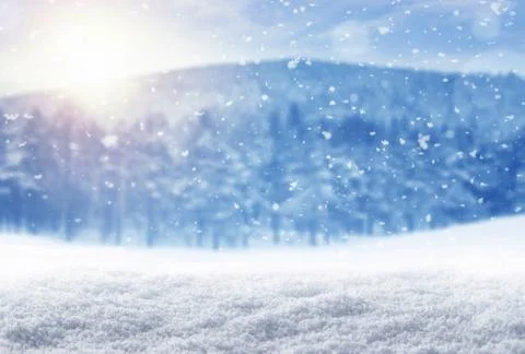 Winter background, falling snow over winter landscape with copy space Stock Photos