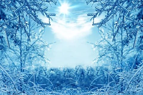 Winter background with icy branches in the foreground Stock-Fotos
