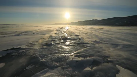 Winter Baikal. Strong wind on the ice, drifting snow. Stock-Footage 89471382