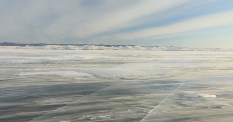 Winter Baikal. Strong wind on the ice, drifting snow. Stock Footage 89475648