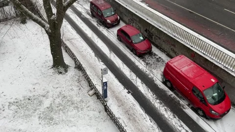 Winter balcony POV facing snowy Putlitzbruecke bridge in Berlin Moabit Stock Footage 331300202