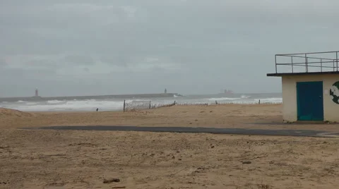 Winter beach with rough waves, lifeguard station Stock Footage 1091825
