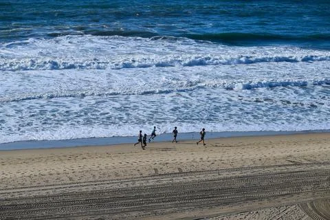 Winter Beach Run Stock Photos