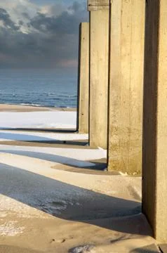 Winter beach shadows Stock Photos