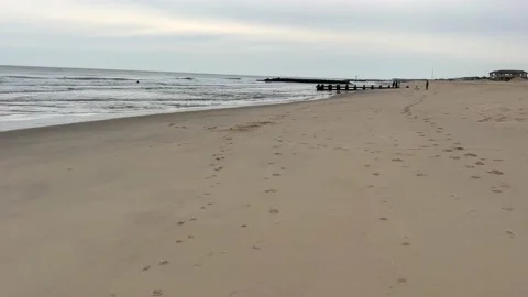 Winter beach / shore with cloudy sky overcast - 4k Nature Stock Footage 236066829