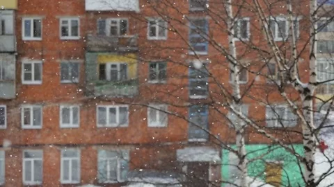 Winter beautiful snowfall view from window outdoor in slow motion and changes Stock Footage 73954177