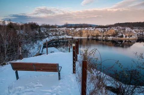 Winter Bench Overlooking Tranquil Lake Stock Photos