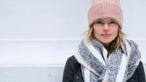 Winter blond in pink hat Stock Footage 83431583