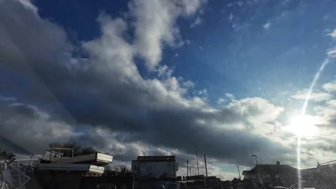 Winter Blue Sky and Clouds over British Town and Cities Video stock 324755036
