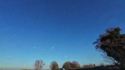 Winter Blue Sky over British Town and Cities During Car Drive Video stock 325738887
