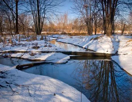 Winter blue stream Stock Photos