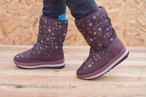 Winter boots, close-up Stock Photos
