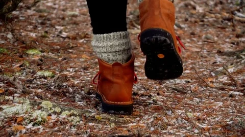 Winter boots in the forest Stock Footage 71614463