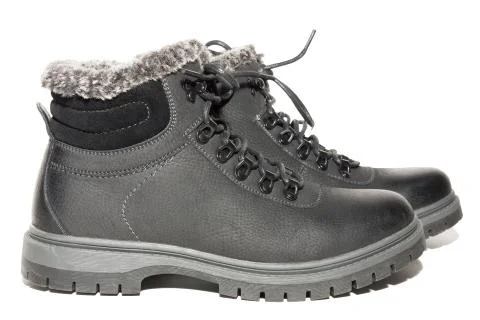 Winter boots on a white background Stock Photos