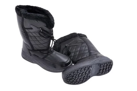 Winter boots on white Stock Photos