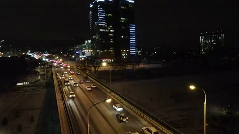 Winter bridge over the river leading to the city Stock Footage 146435984