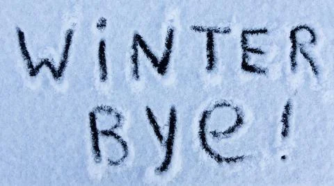 Winter Bye words written on the surface of a snow field. Stock Photos