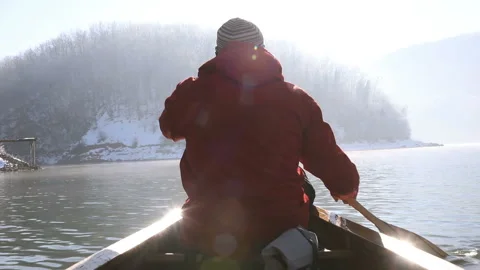 Winter canoe ride Stock Footage 169642153