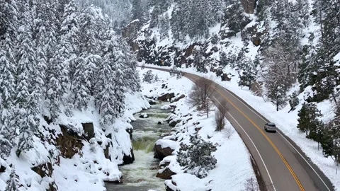Winter Canyon Road 07 | US HWY 34 | Waterfall &amp; River | Snow | 4K Drone Footage Stock Footage 289780574