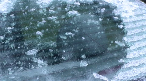 Winter - Car - Rear Window Scraping - with Audio Stock Footage 42934410