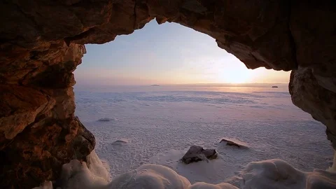 Winter. The cave in the rock is covered with ice. Lake Baikal Video stock 73766681