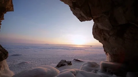 Winter. The cave in the rock is covered with ice. Lake Baikal 스톡 동영상 73766706