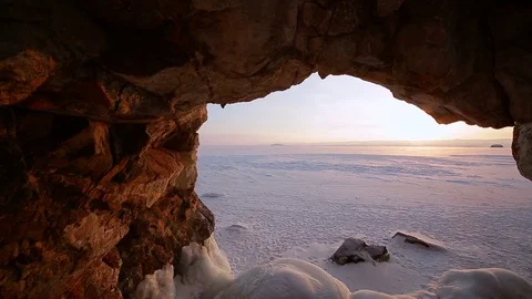 Winter. The cave in the rock is covered with ice. Lake Baikal Stock Footage 73767314