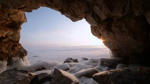 Winter. The cave in the rock is covered with ice. Lake Baikal Stock Footage 73767429