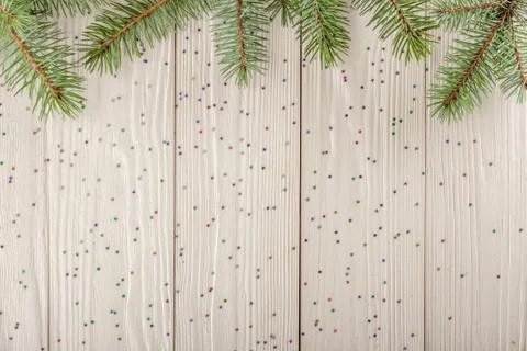 Winter Christmas pattern for Your design. Wooden background white. Spruce bra Stock Photos