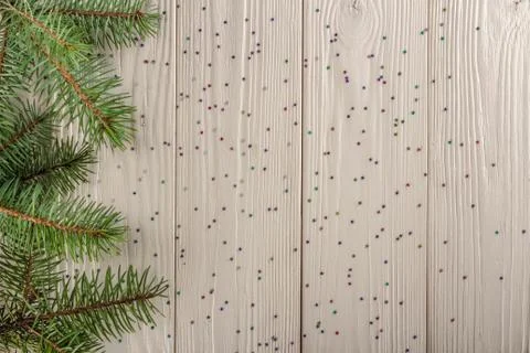 Winter Christmas pattern for Your design. Wooden background white. Spruce bra Stock Photos