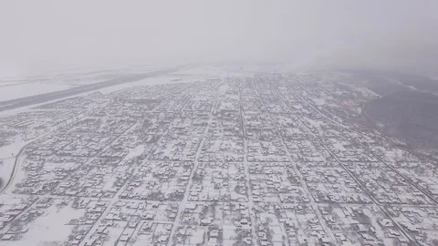 Winter city, aerial camera, around the city forest Stock Footage 85559357